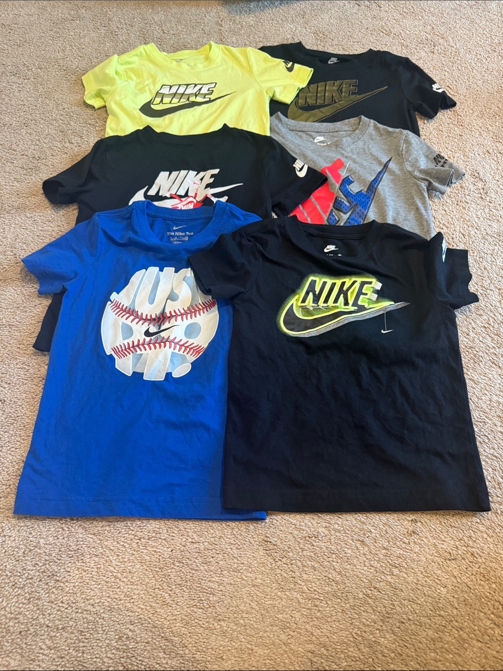 Nike Kids Short Sleeve Logo Tees in Black, Blue, Gray & Yellow